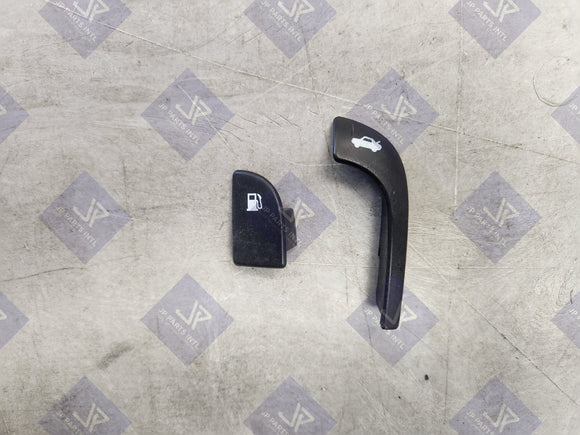 1999-2003 Mazda Protege Black Trunk & Gas Door Release Trim