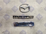 1999-2000 Mazda Protege Trunk Emblem Badge Kit