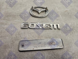 1999-2000 Mazda Protege Trunk Emblem Badge Kit