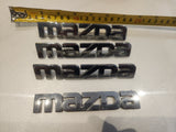 2001 - 2003 Mazda  Badge